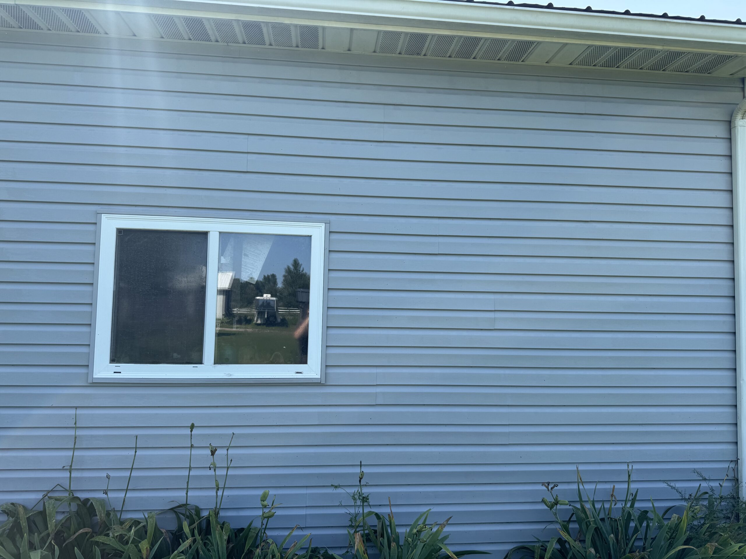 Pristine exterior walkway and concrete surface after power washing